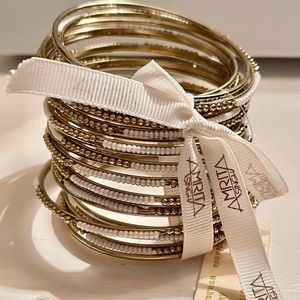 Amrita Singh bracelets: ivory and gold collection.